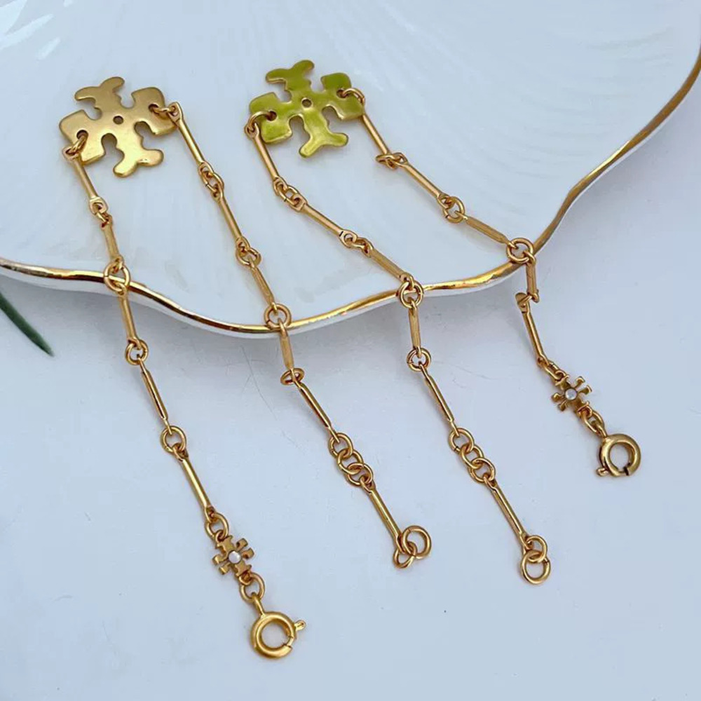 Tory Burch Cross Flower Bamboo Joint Chain Bracelet